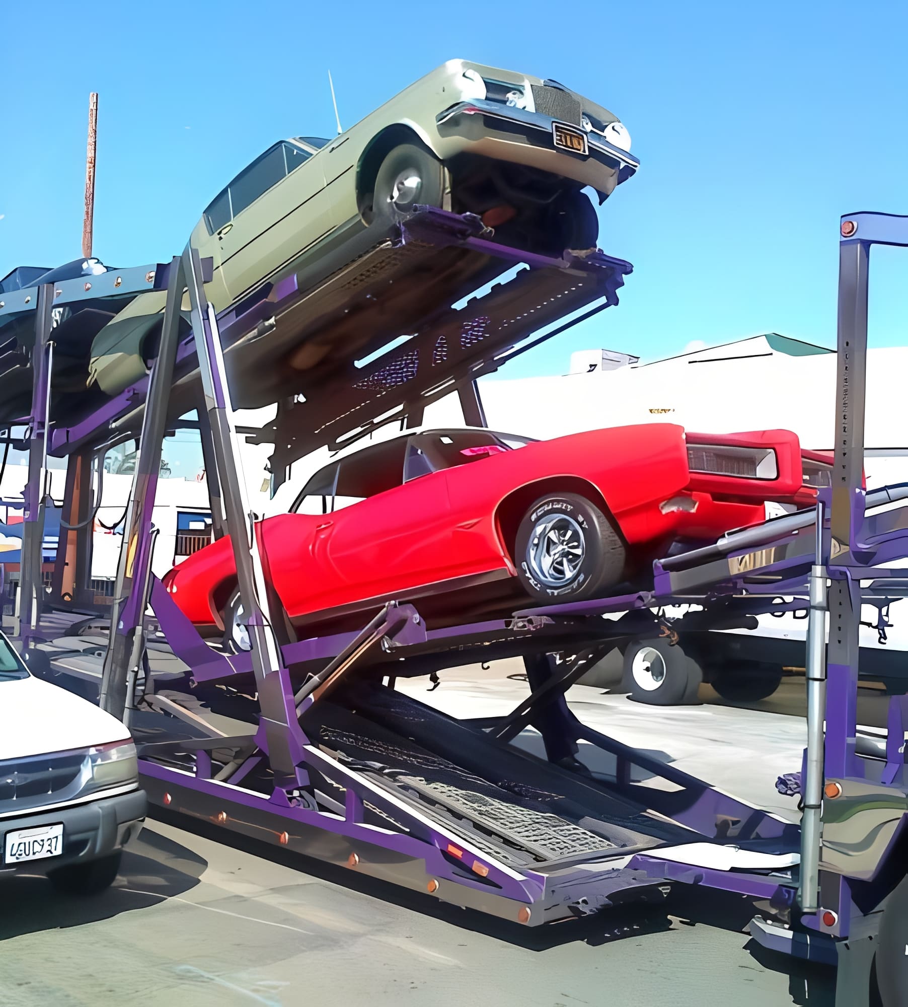 Cars loaded on a multi-level car carrier.